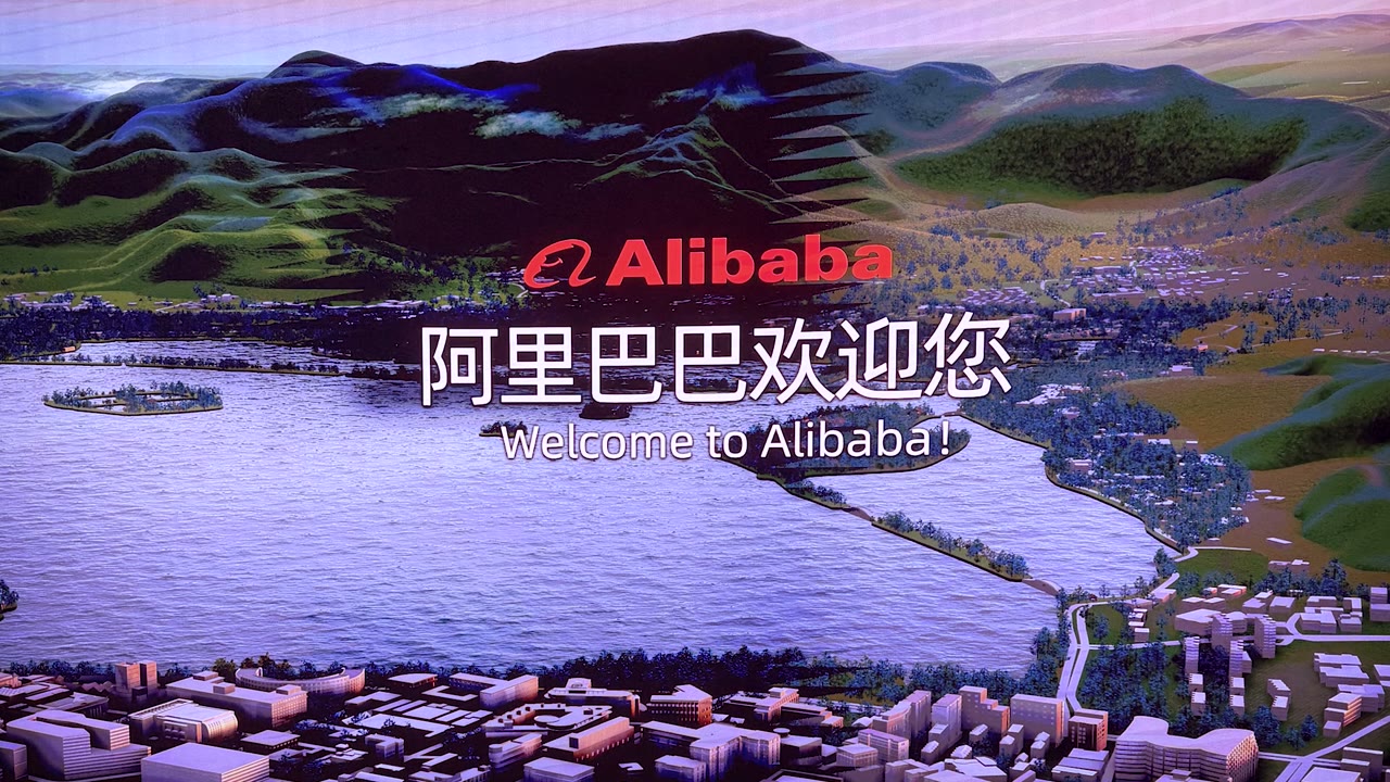 Welcome to Alibaba sign over a scale model of the campus and West Lake